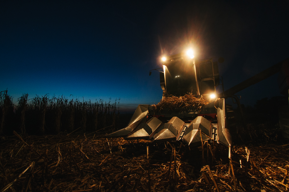 allis-chalmers-combine-harvesting-field-at-night-4252