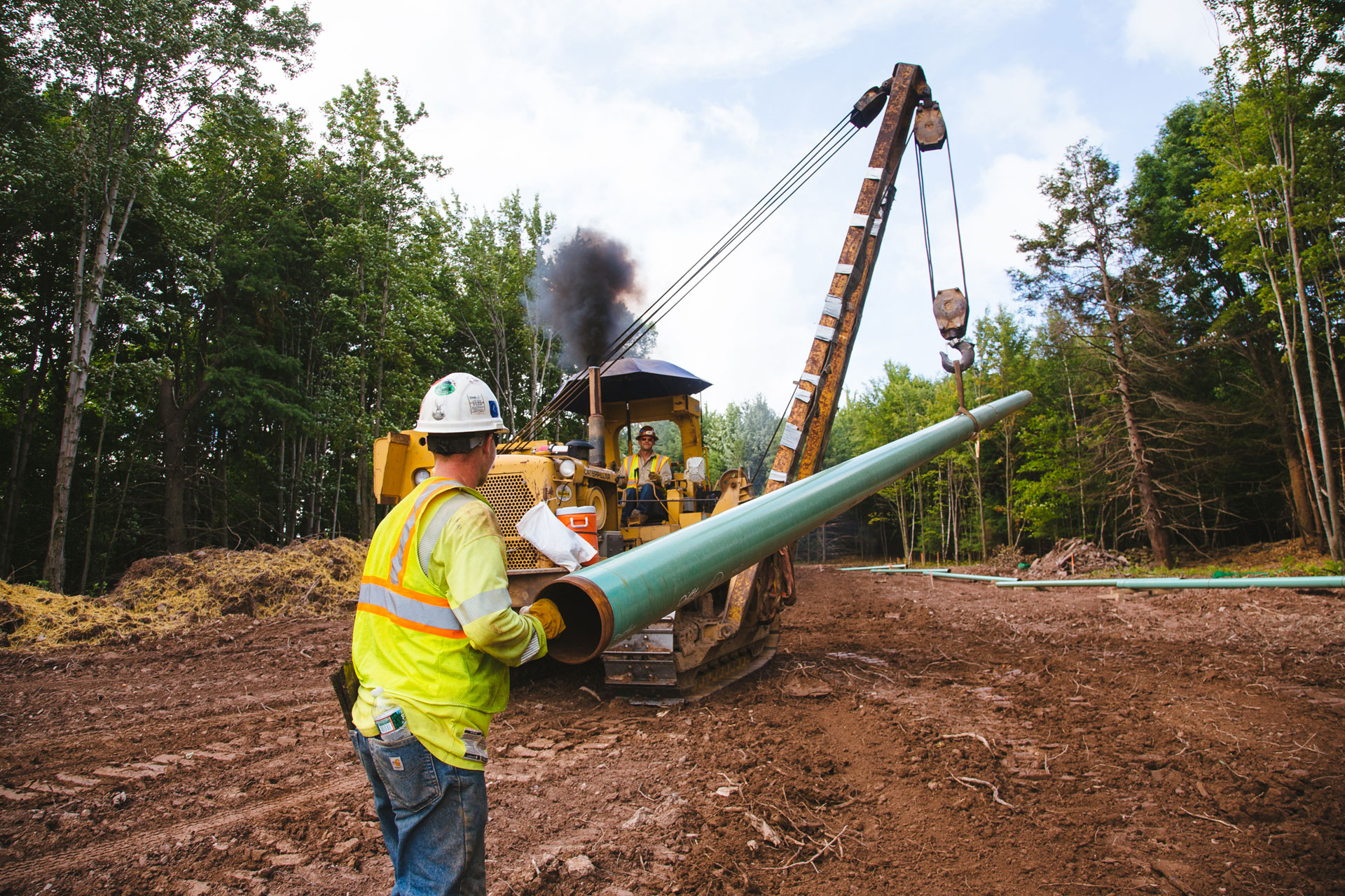 Pipeline Industry Workers Installing New Cude Oil And Natural Gas pipeline-industry-workers-installing-new-cude-oil-and-natural-gas